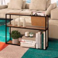 Industrial style end table with 2 shelves and 1 magazine rack. Made of wood and black steel frame